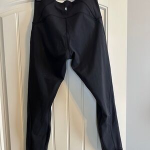 lululemon athletica Black Leggings GUC, mesh down outside of legs